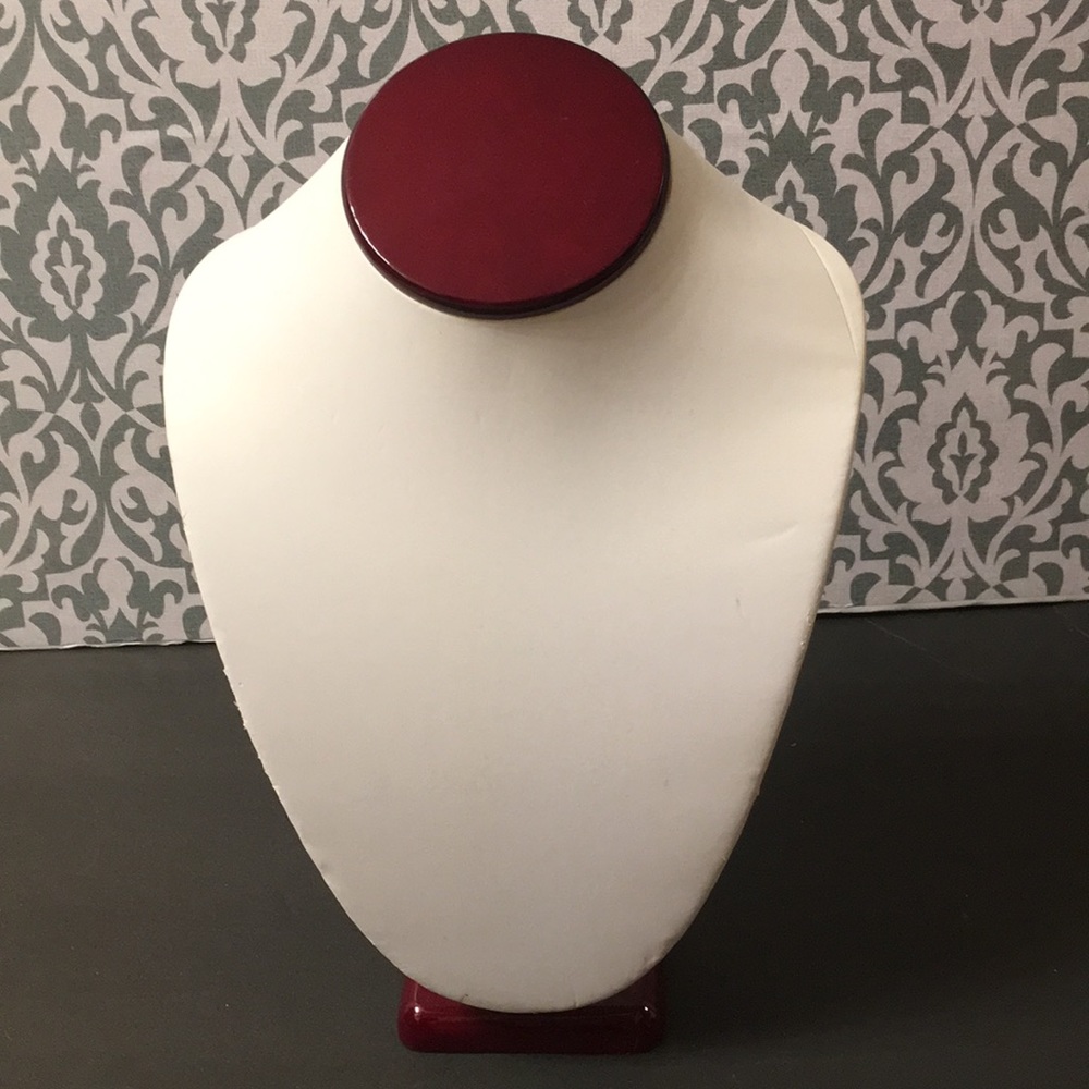 Rosewood and white leatherette Jewelry display.